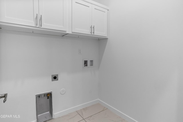 laundry room with electric dryer hookup, hookup for a gas dryer, hookup for a washing machine, and cabinets