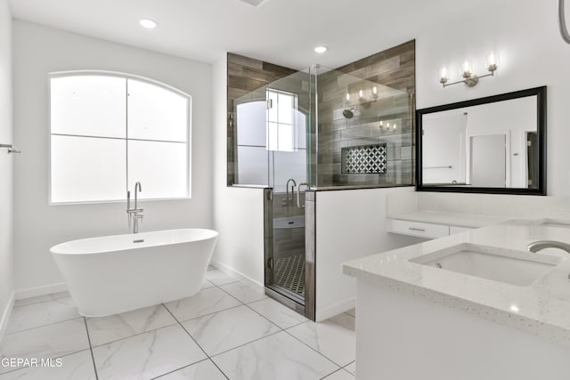 bathroom with independent shower and bath and vanity