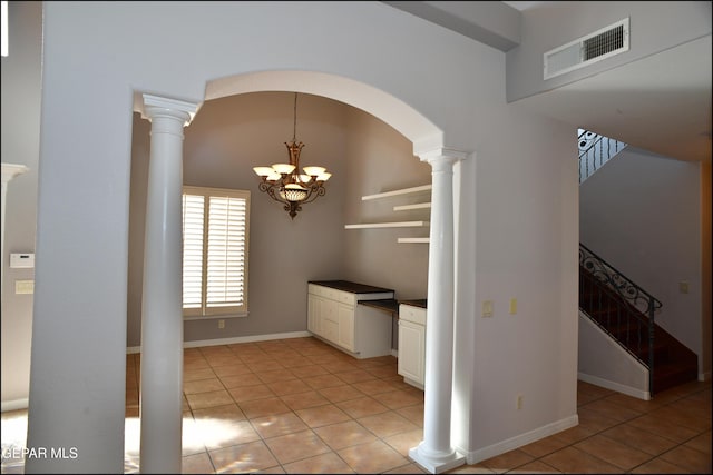 interior space with a chandelier