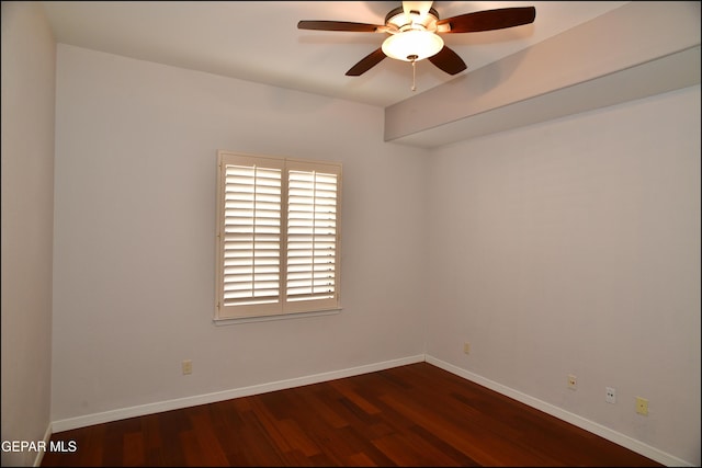 unfurnished room with ceiling fan and dark wood-type flooring