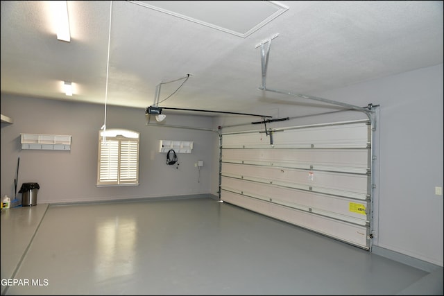 garage featuring a garage door opener