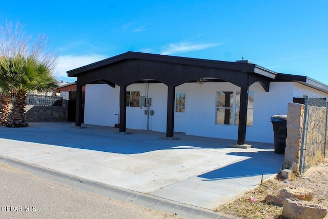 view of front facade featuring a patio area and ceiling fan