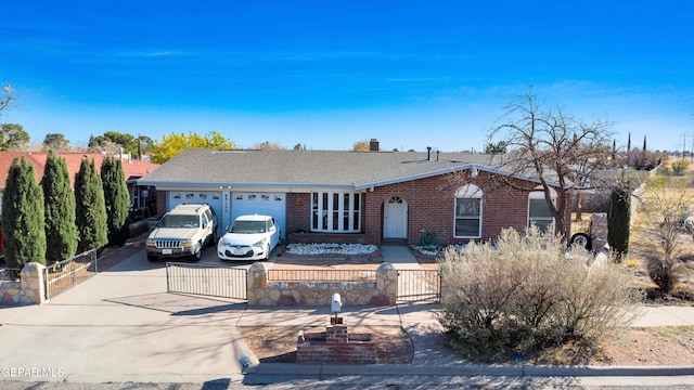 single story home with a garage