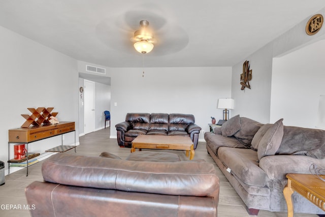 living room with ceiling fan