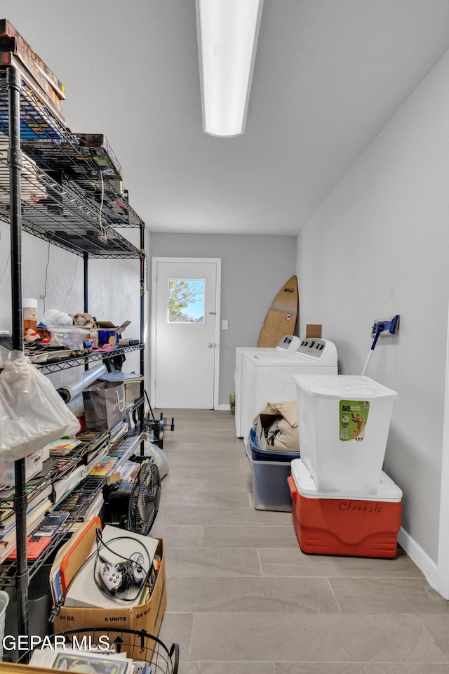 laundry room featuring separate washer and dryer