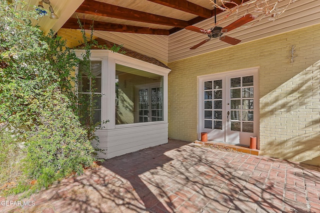 view of patio with french doors and ceiling fan