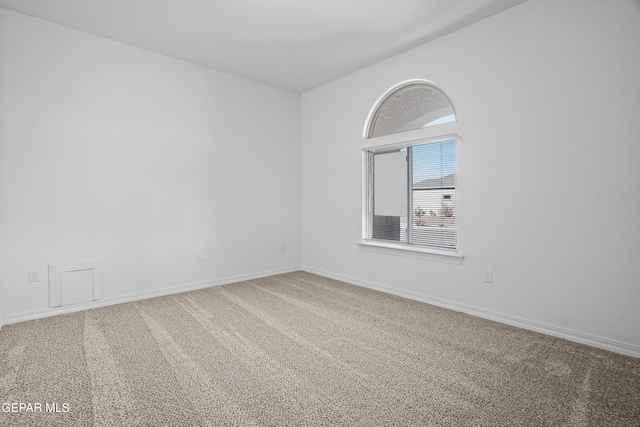 view of carpeted spare room