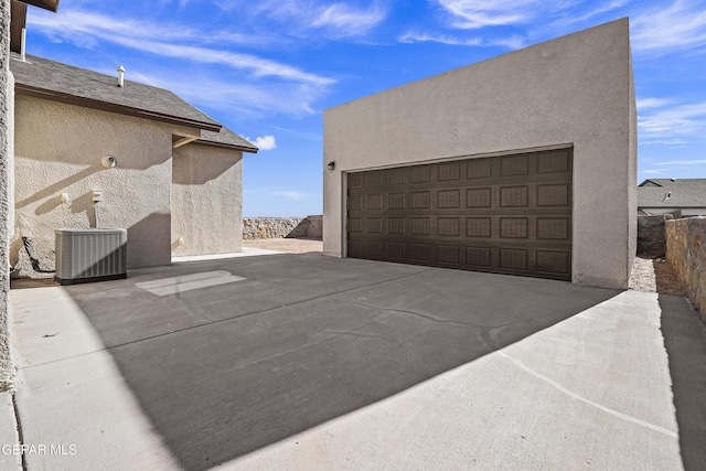 garage with central AC unit