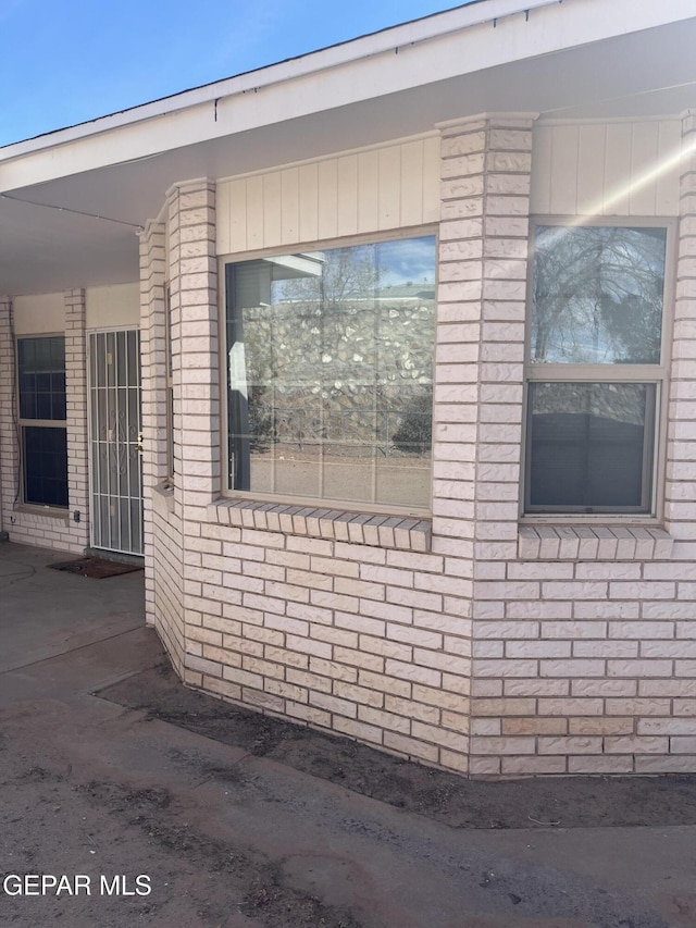 view of side of home featuring a patio