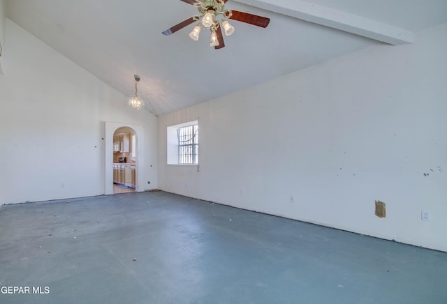 unfurnished room featuring vaulted ceiling with beams and ceiling fan