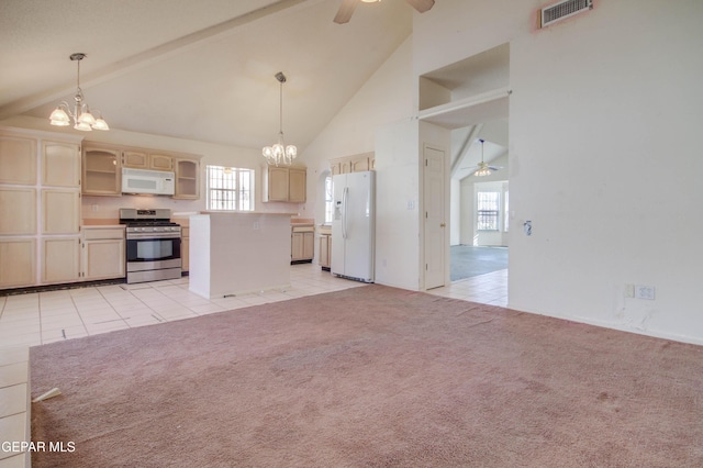 kitchen featuring light carpet, white appliances, decorative light fixtures, and high vaulted ceiling