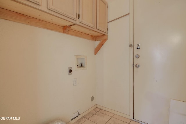 laundry area featuring cabinets, hookup for a washing machine, electric dryer hookup, and light tile patterned flooring