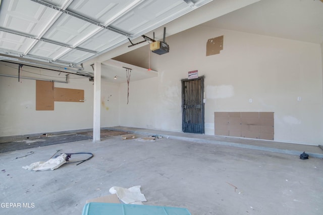 garage featuring a garage door opener