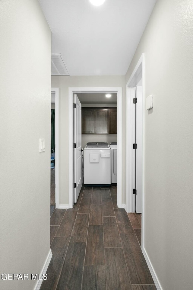 hallway featuring separate washer and dryer