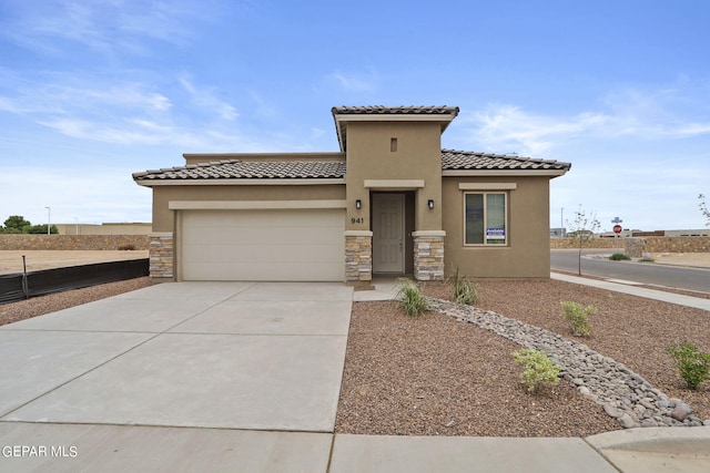 view of front of home with a garage