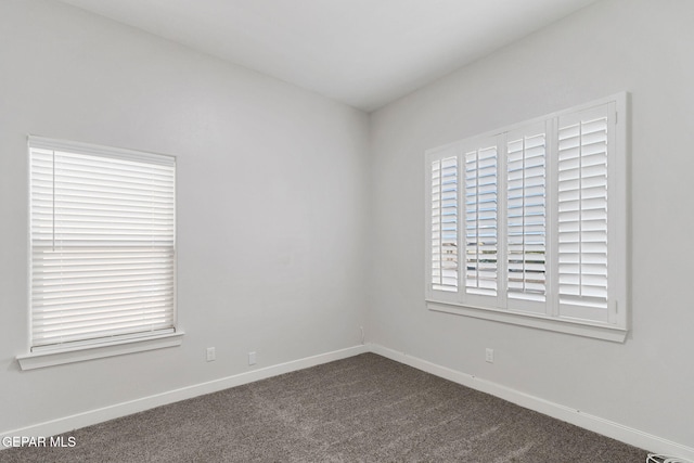 view of carpeted spare room