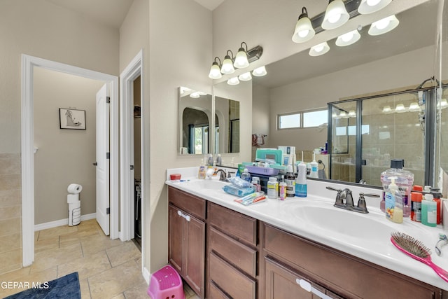 bathroom featuring vanity and walk in shower