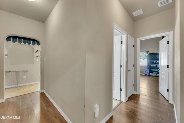 hallway featuring hardwood / wood-style floors