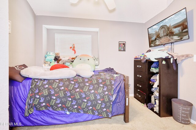 11948 Mcauliffe Dr, El Paso, TX 79936 - carpeted bedroom with a ceiling fan