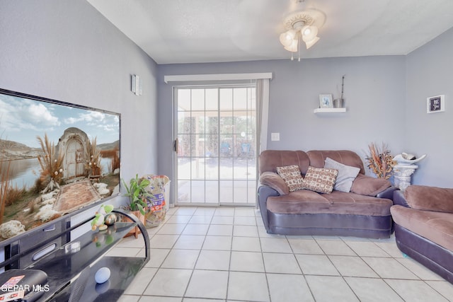 11948 Mcauliffe Dr, El Paso, TX 79936 - living room with ceiling fan and light tile patterned floors