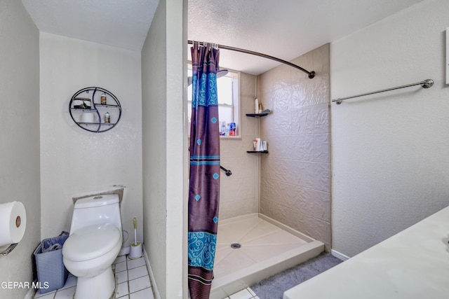 11948 Mcauliffe Dr, El Paso, TX 79936 - bathroom with a shower stall, toilet, and a textured wall