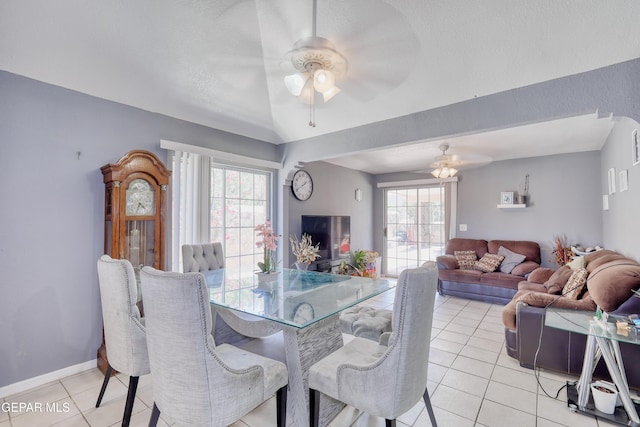 11948 Mcauliffe Dr, El Paso, TX 79936 - dining space with a ceiling fan, light tile patterned flooring, healthy amount of natural light, and baseboards