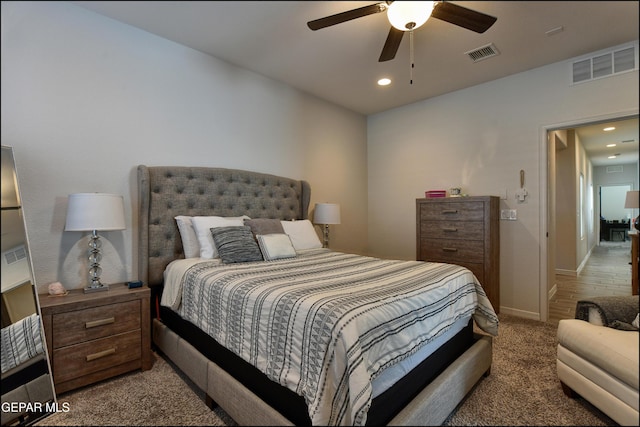 carpeted bedroom with ceiling fan