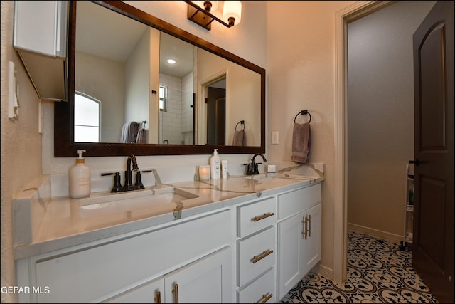 bathroom featuring tile patterned floors and vanity