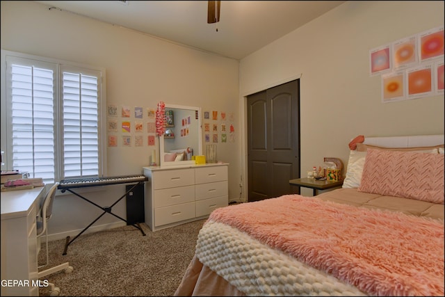 carpeted bedroom with multiple windows and ceiling fan