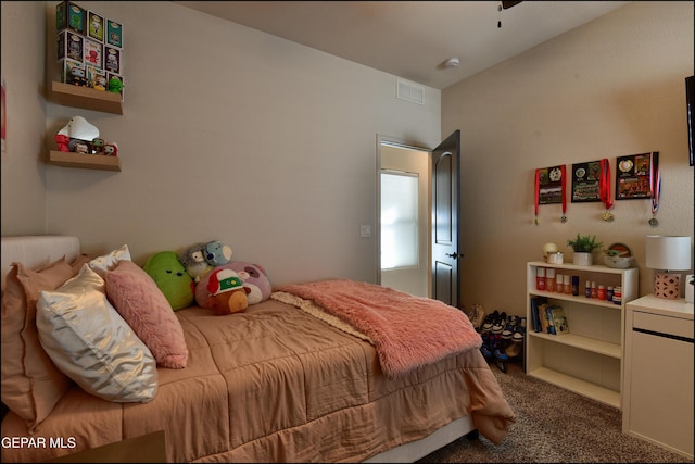 bedroom featuring carpet