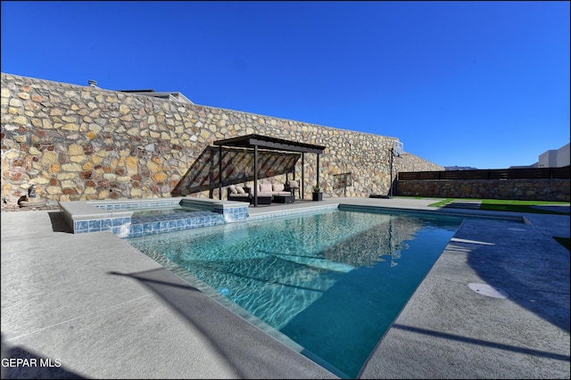 view of pool featuring an in ground hot tub and a patio area