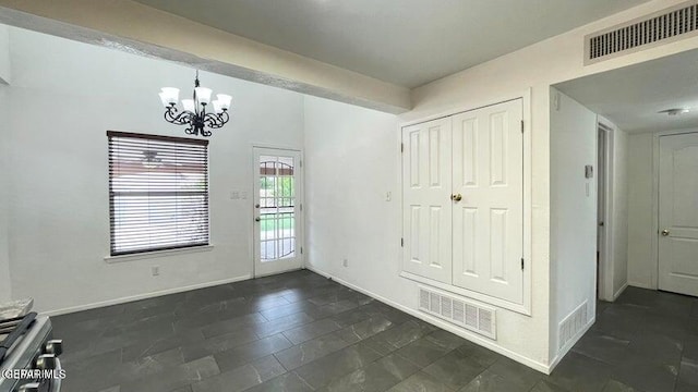 interior space with a chandelier