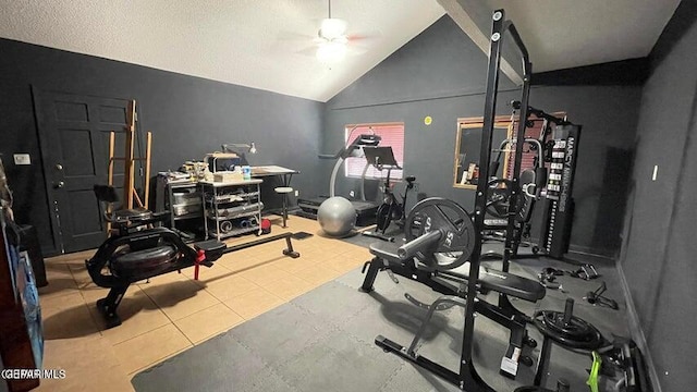 exercise room featuring ceiling fan and lofted ceiling