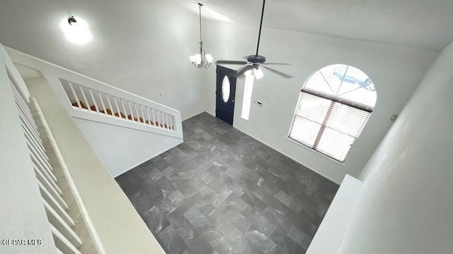 foyer with ceiling fan with notable chandelier