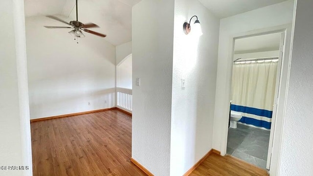 interior space with ceiling fan and hardwood / wood-style floors