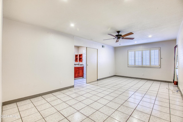 unfurnished room featuring ceiling fan