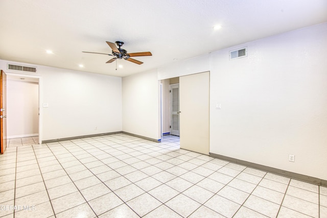 spare room featuring ceiling fan