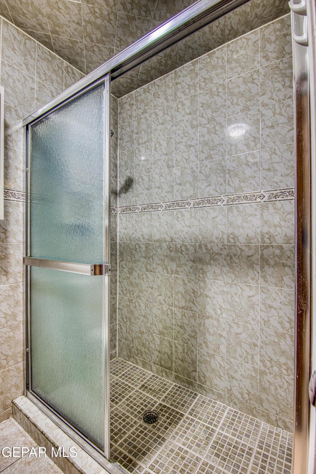 bathroom with walk in shower