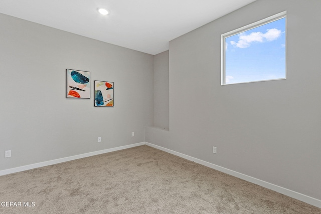 view of carpeted spare room