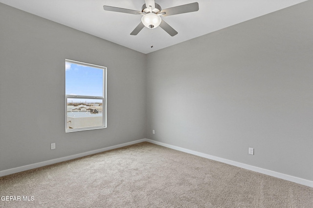 unfurnished room with carpet floors and ceiling fan