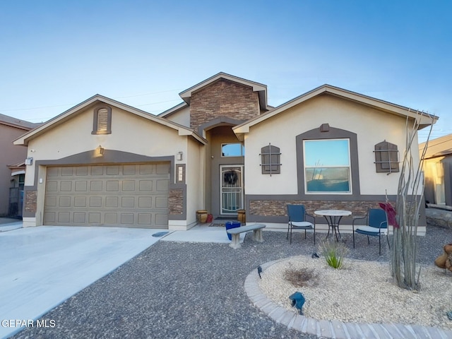 view of front of property with a garage