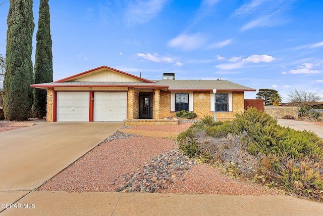 ranch-style home with a garage