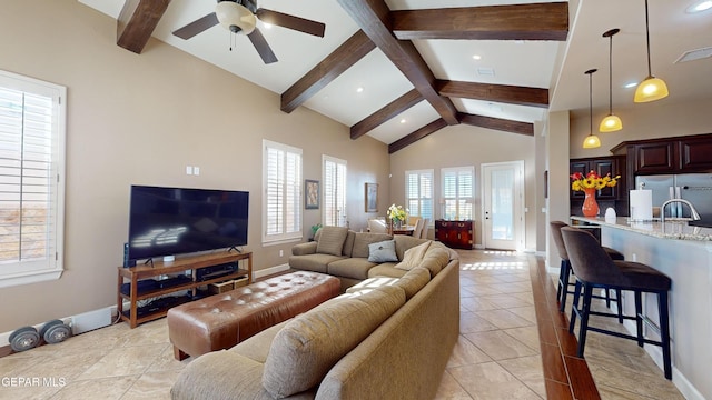 tiled living room featuring beam ceiling, ceiling fan, and high vaulted ceiling