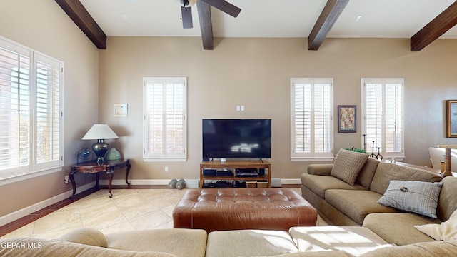 living room with ceiling fan and beam ceiling