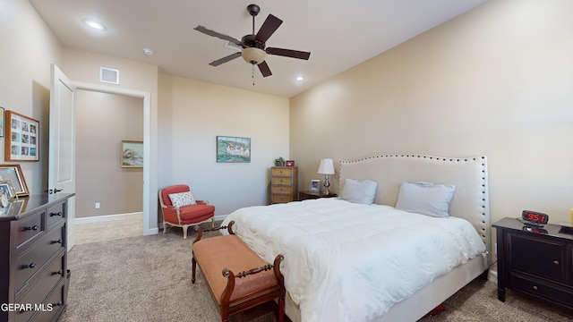 carpeted bedroom with ceiling fan