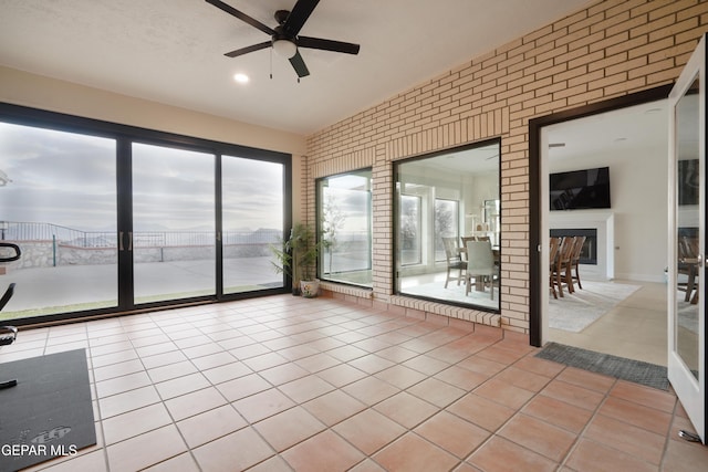 interior space featuring ceiling fan