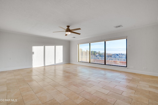 unfurnished room featuring a textured ceiling, ceiling fan, light tile patterned flooring, and crown molding