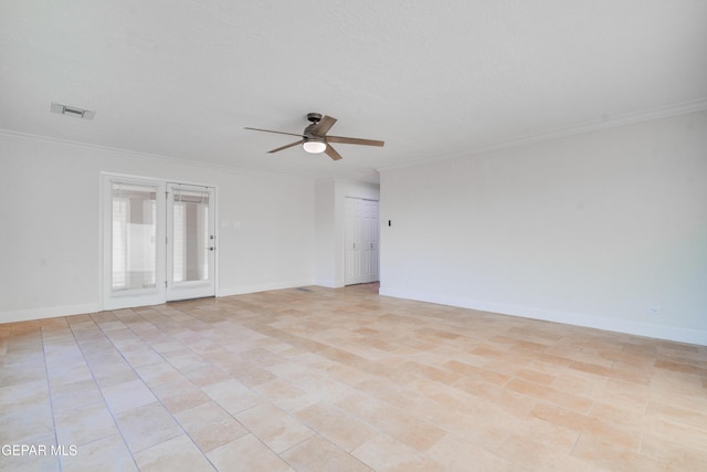 unfurnished room featuring ceiling fan and crown molding