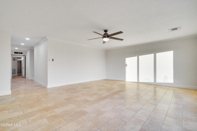 unfurnished room with ceiling fan, a textured ceiling, and ornamental molding