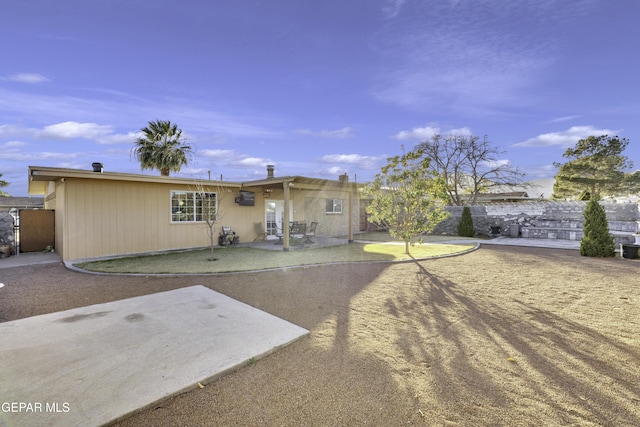 back of property with a patio area